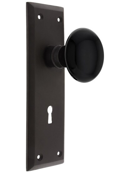 New York Plate with Black Porcelain Knob with Keyhole in Oil Rubbed Bronze.